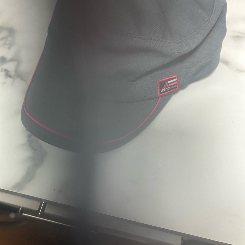 Adidas golf hat. Never worn.